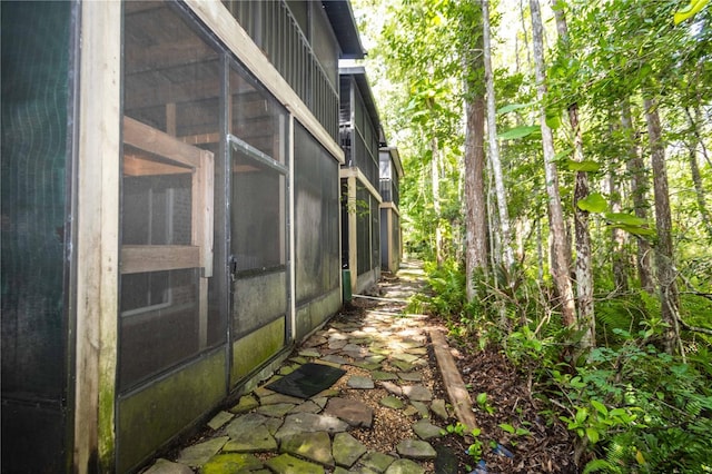 4117 Daventry Ln, Palm Harbor, FL 34685 - view of home's exterior featuring a sunroom