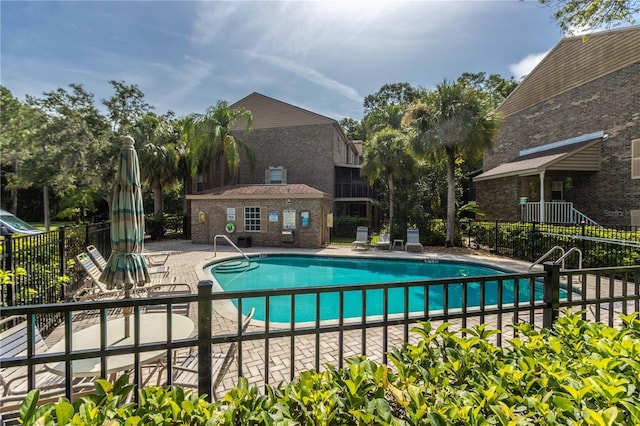4117 Daventry Ln, Palm Harbor, FL 34685 - community pool featuring a patio