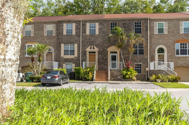 4117 Daventry Ln, Palm Harbor, FL 34685 - view of property featuring brick siding