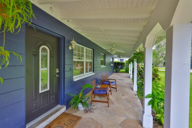 1708 Pond Lake Dr, Tampa, FL 33612 - property entrance with covered porch and ceiling fan
