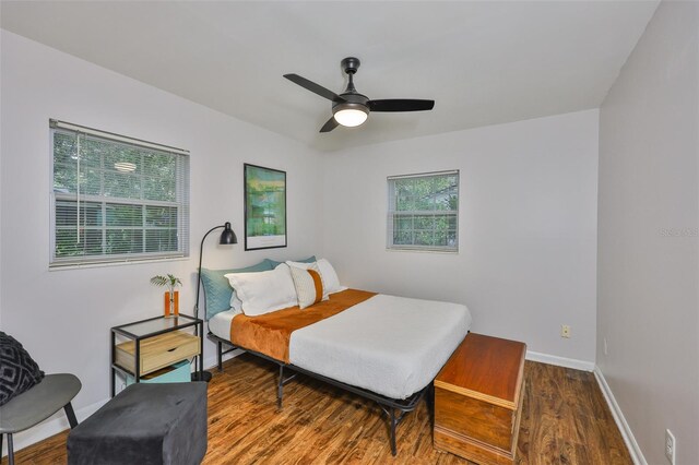 1708 Pond Lake Dr, Tampa, FL 33612 - bedroom with wood finished floors and a ceiling fan