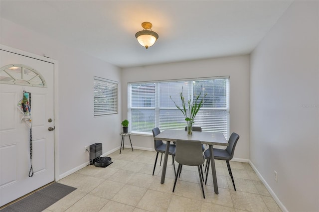 1708 Pond Lake Dr, Tampa, FL 33612 - dining area with light tile patterned floors