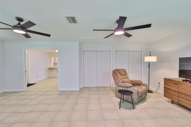 1708 Pond Lake Dr, Tampa, FL 33612 - sitting room with ceiling fan and attic access