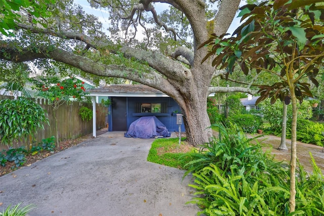 1708 Pond Lake Dr, Tampa, FL 33612 - view of patio with a carport