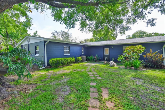 1708 Pond Lake Dr, Tampa, FL 33612 - rear view of property with a lawn