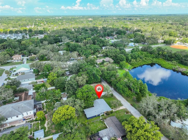 1708 Pond Lake Dr, Tampa, FL 33612 - aerial view of residential area with a large body of water and a heavily wooded area