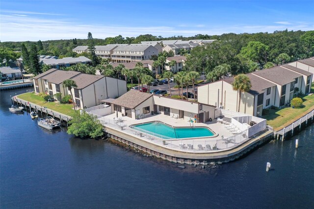 358 Moorings Cove Dr Unit 4B, Tarpon Springs, FL 34689 - aerial view of residential area featuring a nearby body of water and a pool area