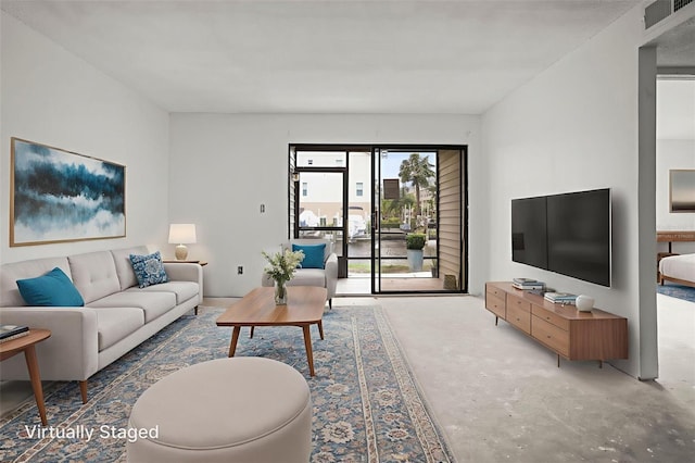358 Moorings Cove Dr Unit 4B, Tarpon Springs, FL 34689 - living room featuring concrete floors