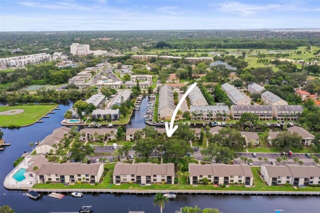 358 Moorings Cove Dr Unit 4B, Tarpon Springs, FL 34689 - aerial view of property's location featuring a nearby body of water and nearby suburban area