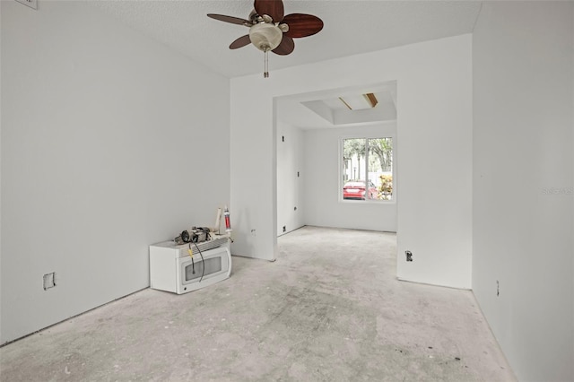358 Moorings Cove Dr Unit 4B, Tarpon Springs, FL 34689 - unfurnished room with a ceiling fan and unfinished concrete floors