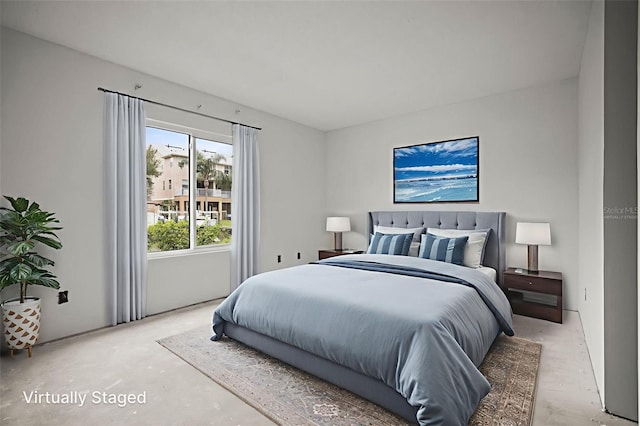 358 Moorings Cove Dr Unit 4B, Tarpon Springs, FL 34689 - bedroom with concrete flooring