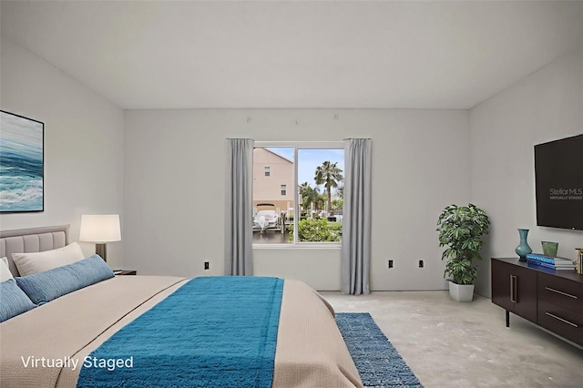 358 Moorings Cove Dr Unit 4B, Tarpon Springs, FL 34689 - bedroom with concrete floors