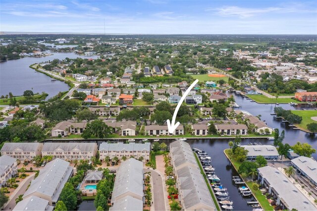 358 Moorings Cove Dr Unit 4B, Tarpon Springs, FL 34689 - aerial view of property's location featuring a nearby body of water and nearby suburban area