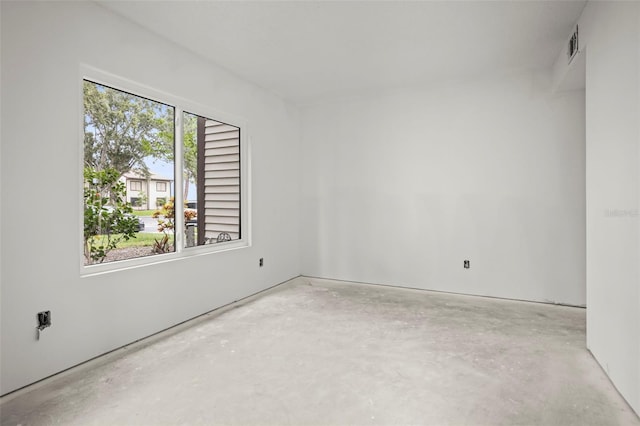 358 Moorings Cove Dr Unit 4B, Tarpon Springs, FL 34689 - spare room featuring concrete flooring