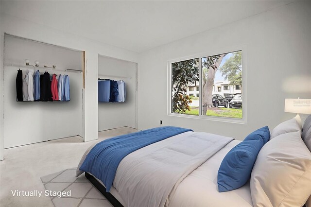 358 Moorings Cove Dr Unit 4B, Tarpon Springs, FL 34689 - bedroom with concrete flooring