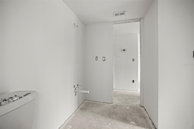 358 Moorings Cove Dr Unit 4B, Tarpon Springs, FL 34689 - hallway featuring concrete flooring