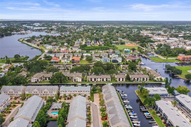 358 Moorings Cove Dr Unit 4B, Tarpon Springs, FL 34689 - aerial view of property's location featuring a nearby body of water and nearby suburban area