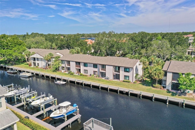 358 Moorings Cove Dr Unit 4B, Tarpon Springs, FL 34689 - dock with boat lift and a water view