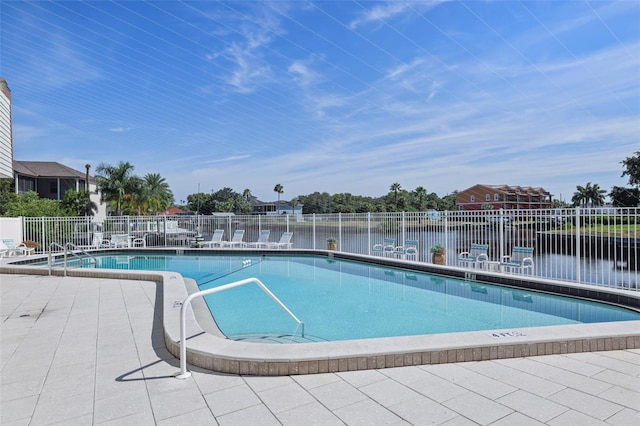 358 Moorings Cove Dr Unit 4B, Tarpon Springs, FL 34689 - community pool featuring a patio
