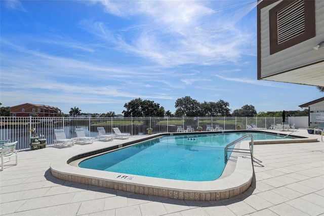 358 Moorings Cove Dr Unit 4B, Tarpon Springs, FL 34689 - community pool with a patio area