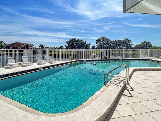 358 Moorings Cove Dr Unit 4B, Tarpon Springs, FL 34689 - community pool with a patio area