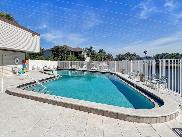 358 Moorings Cove Dr Unit 4B, Tarpon Springs, FL 34689 - community pool with a patio