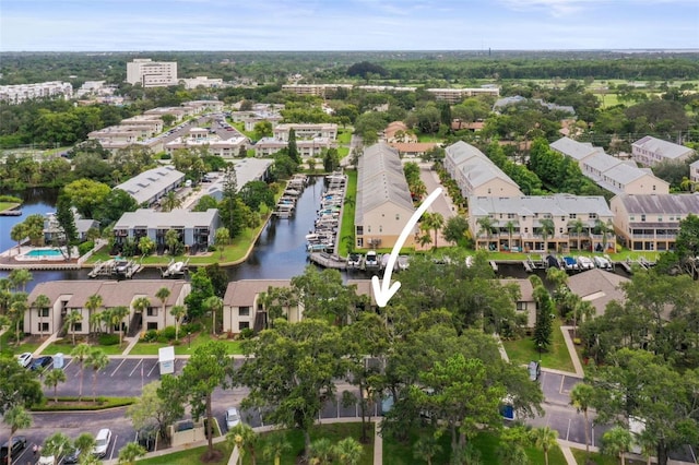 358 Moorings Cove Dr Unit 4B, Tarpon Springs, FL 34689 - aerial view of property and surrounding area with a nearby body of water
