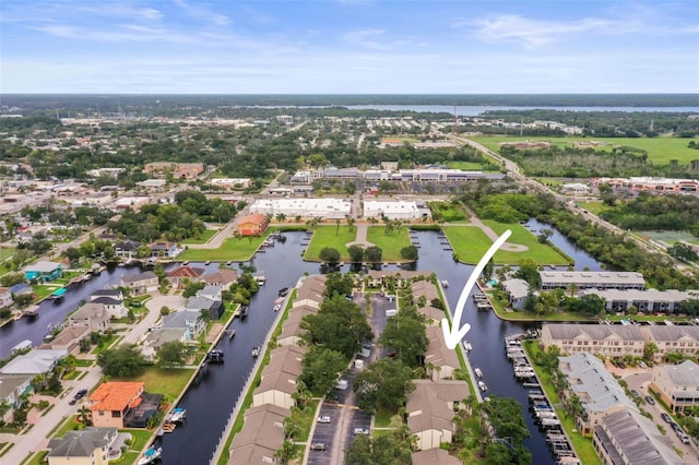 358 Moorings Cove Dr Unit 4B, Tarpon Springs, FL 34689 - aerial overview of property's location with a nearby body of water and nearby suburban area