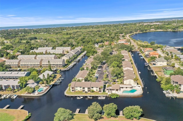 358 Moorings Cove Dr Unit 4B, Tarpon Springs, FL 34689 - aerial perspective of suburban area featuring a nearby body of water