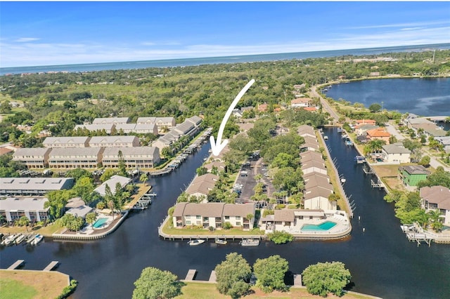 358 Moorings Cove Dr Unit 4B, Tarpon Springs, FL 34689 - aerial overview of property's location featuring a large body of water and nearby suburban area