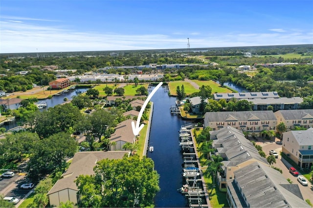 358 Moorings Cove Dr Unit 4B, Tarpon Springs, FL 34689 - aerial perspective of suburban area with a nearby body of water