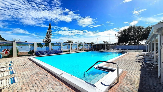 4359 Tahitian Gardens Cir Unit A, Holiday, FL 34691 - community pool featuring a patio