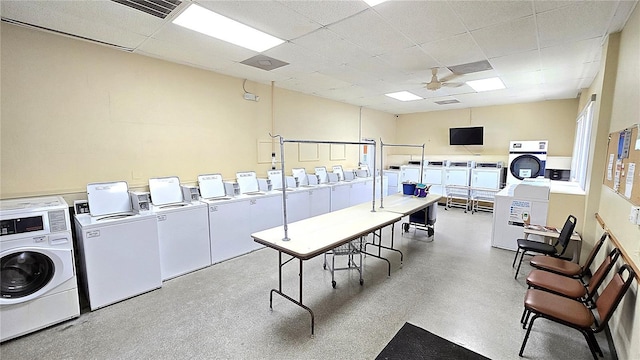 4359 Tahitian Gardens Cir Unit A, Holiday, FL 34691 - community laundry featuring washing machine and dryer and ceiling fan