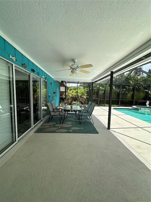 713 Rustic Oaks Dr, Palm Harbor, FL 34684 - unfurnished sunroom featuring a ceiling fan and healthy amount of natural light