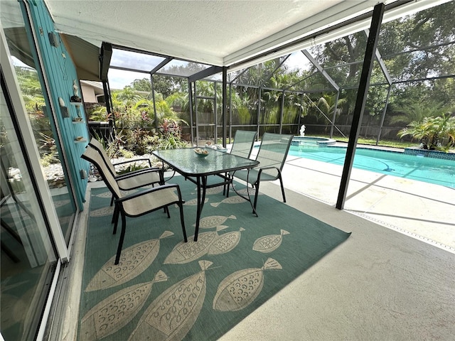 713 Rustic Oaks Dr, Palm Harbor, FL 34684 - sunroom / solarium with a swimming pool