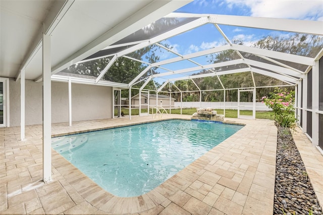 7607 New York Ave, Hudson, FL 34667 - view of pool featuring a storage shed, a patio area, a fenced backyard, and a lanai