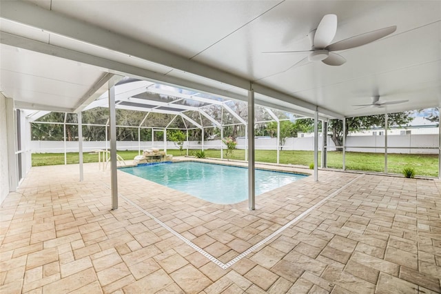 7607 New York Ave, Hudson, FL 34667 - view of swimming pool with a patio area, a ceiling fan, a fenced backyard, and glass enclosure