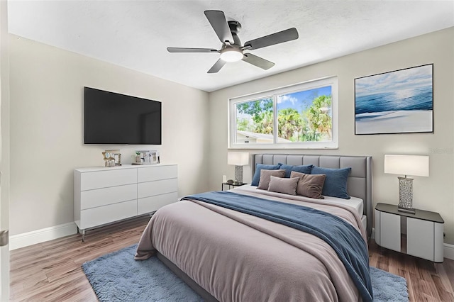 7607 New York Ave, Hudson, FL 34667 - bedroom featuring wood finished floors and ceiling fan