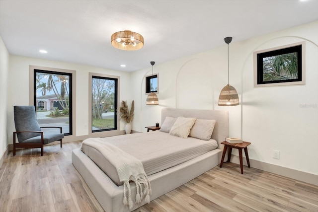 203 Driftwood Dr W, Palm Harbor, FL 34683 - bedroom featuring light wood-style floors and recessed lighting