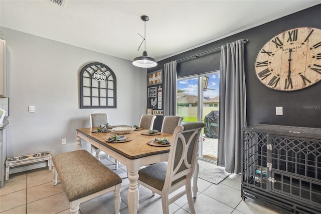 33678 Jasper Stone Dr, Wesley Chapel, FL 33543 - dining area featuring light tile patterned floors