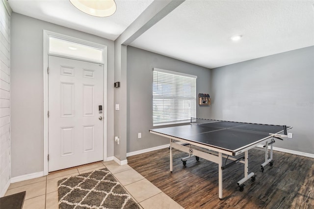 33678 Jasper Stone Dr, Wesley Chapel, FL 33543 - game room featuring tile patterned flooring and a textured ceiling