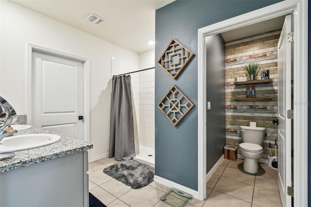 33678 Jasper Stone Dr, Wesley Chapel, FL 33543 - bathroom with a shower stall, tile patterned floors, and vanity