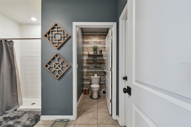 33678 Jasper Stone Dr, Wesley Chapel, FL 33543 - bathroom featuring a stall shower and tile patterned flooring