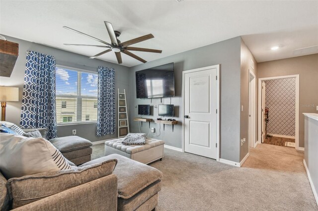 33678 Jasper Stone Dr, Wesley Chapel, FL 33543 - living room featuring a ceiling fan and carpet flooring