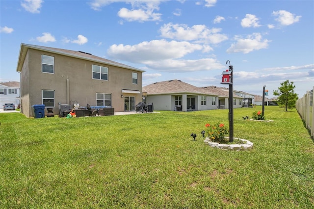 33678 Jasper Stone Dr, Wesley Chapel, FL 33543 - back of house with stucco siding