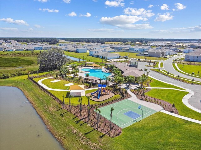 33678 Jasper Stone Dr, Wesley Chapel, FL 33543 - aerial perspective of suburban area featuring a pool and a nearby body of water