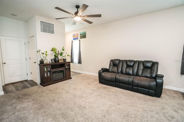 35210 Daisy Meadow Loop, Zephyrhills, FL 33541 - living room featuring carpet and a ceiling fan