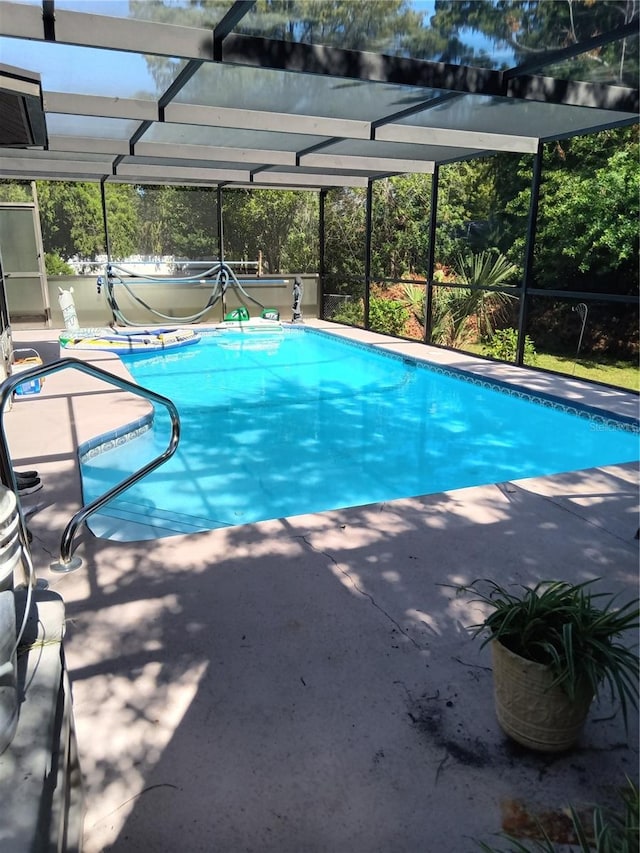 7307 Windsor Mill Rd, Hudson, FL 34667 - swimming pool featuring a lanai and a patio area