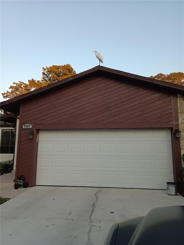 7307 Windsor Mill Rd, Hudson, FL 34667 - garage with concrete driveway