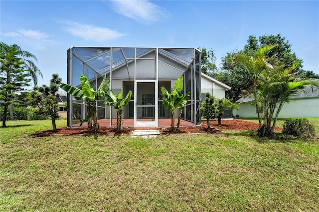 1725 Bondurant Way, Brandon, FL 33511 - rear view of property with a lawn, a patio, and glass enclosure